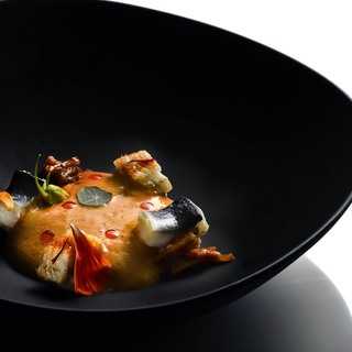 C joan pujol  creus dried eel from delta de l'ebre with garlic foam and saffron  charcoal grilled eel  stir fry dried potato and saffron oil18290290